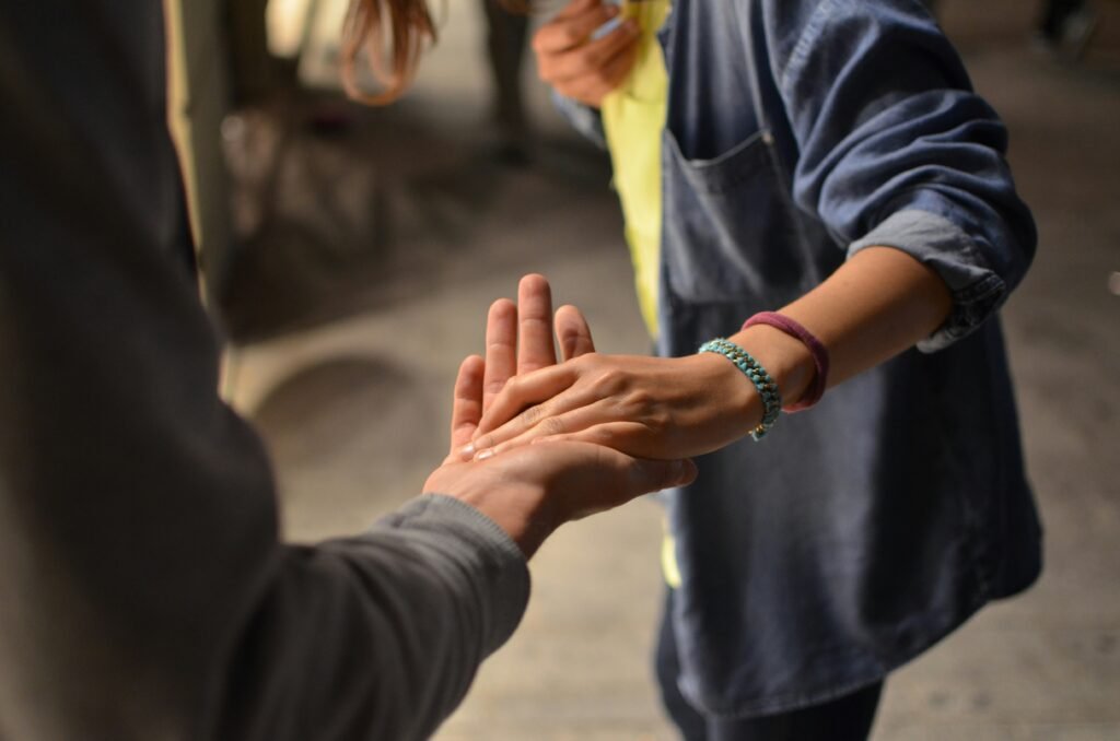 holding the hand of a stranger